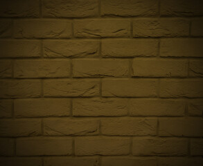 Horizontal yellow brickwork with damage. Dark yellow background with brick texture and vignette. The old wall.
