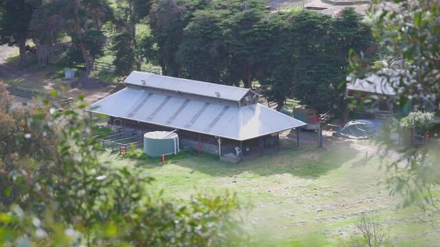 Aerial view of farm house on sunny day in Australia