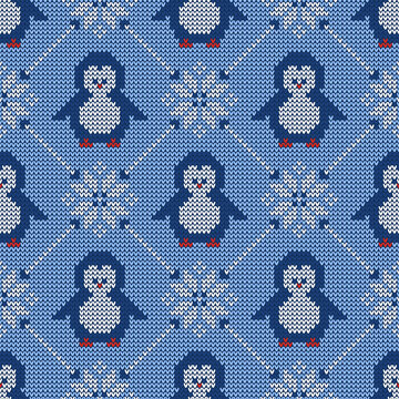 Knitted seamless pattern with penguins and scandinavian ornament. Winter sweater background. Vector illustration.