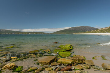 Shot of rocks in the water at the Keel beach, Achill Island, County Mayo, Ireland