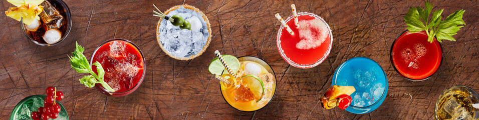 Assorted tropical cocktail on wooden table
