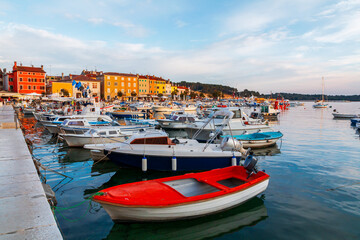 Fototapeta na wymiar Rovinj cozy little seaside old town with harbor on the Istrian peninsula in Adriatic sea at sunset