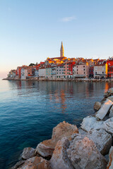 Fototapeta na wymiar Rovinj cozy little seaside old town with harbor on the Istrian peninsula in Adriatic sea at sunrise