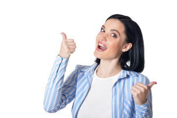 Portrait of smiling young woman with thumbs up