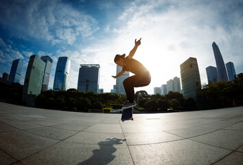 Skateboarder skateboarding outdoors in city