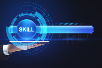 Close up of businessman hand holding pad with abstract glowing skill bar on blue background. Training, education, technology and improvement concept.