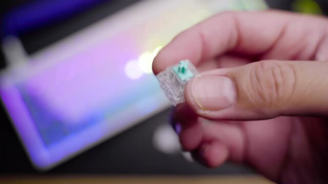 Footage of a person testing the linear switch for custom build mechanical DIY keyboard.
