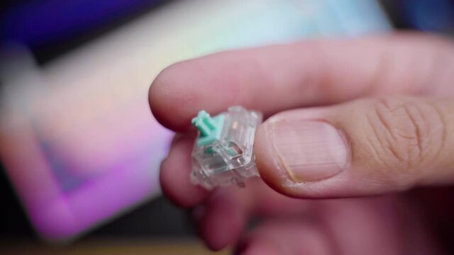 Footage of a person testing the linear switch for custom build mechanical DIY keyboard.