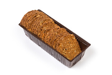 Brown rusks with different seeds in plastic packaging
