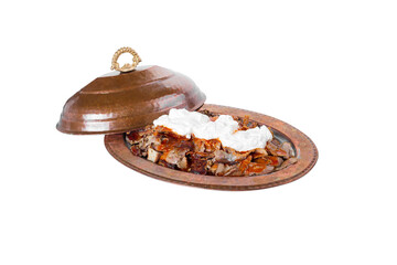 Traditional turkish iskender kebab in copper plate with yogurt and copper cover. iskender on white background.