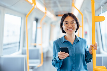 Portrait of asian woman in european public transport.