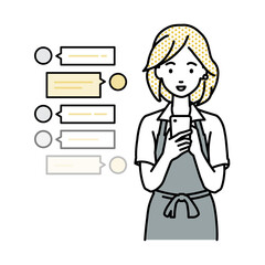 立ってスマートフォンで楽しくチャットで会話するカフェ店員の女性