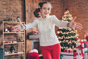 Photo of young girl millennial happy positive smile open hands welcome hug cuddle invite celebration christmas indoors