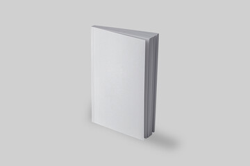 Empty blank white book mock up isolated on a grey background. book in vertical position. 3d rendering. 