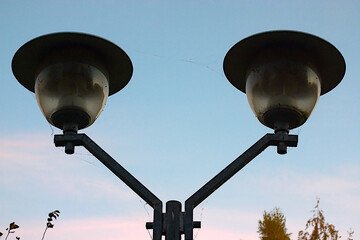 a street light in an autumn park