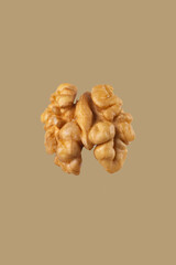 walnut and a cracked walnut isolated on the white background