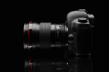 photo and video camera silhouette, side view, black background