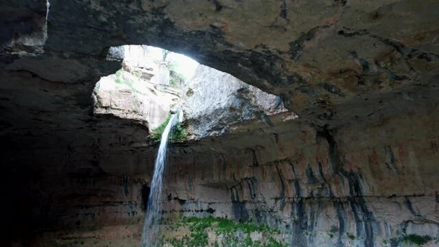 Plunge Waterfall At Balaa Gorge Sinkhole In Tannourine, Lebanon. - aerial approach