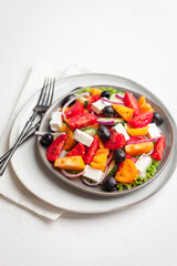 Greek salad with fresh vegetables, feta cheese and black olives. Healthy food 