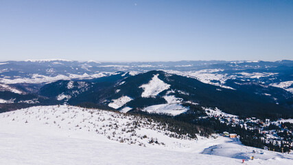 Fototapeta na wymiar panoramic view of winter snowed mountains