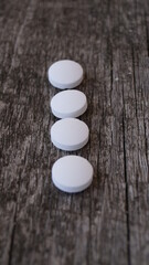 pills on a black background