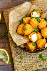  Home made Crispy Chicken   Popcorn   nuggets with  tomato ketchup sauce on wooden background