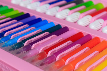 Set of felt-tip pens of different colors in case. selective focus. Creativity background, bright background. Drawing markers, artist tools, creativity, leisure, hobby. Colorful school supplies