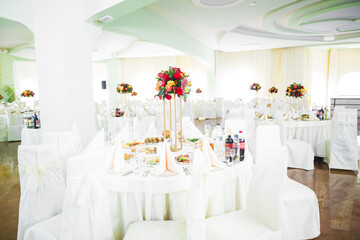 Interior of a restaurant prepared for wedding ceremony