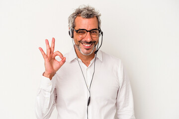 Middle age telemarketer caucasian man isolated on white background  cheerful and confident showing ok gesture.