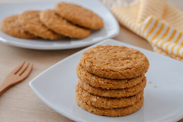 Fototapeta na wymiar Oatmeal cookies on white plate