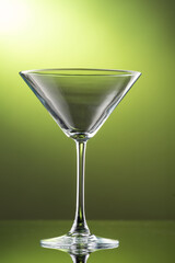 martini glass on green background