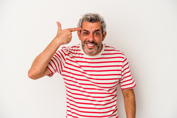 Middle age caucasian man isolated on white background  showing a disappointment gesture with forefinger.