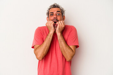 Middle age caucasian man isolated on white background  biting fingernails, nervous and very anxious.