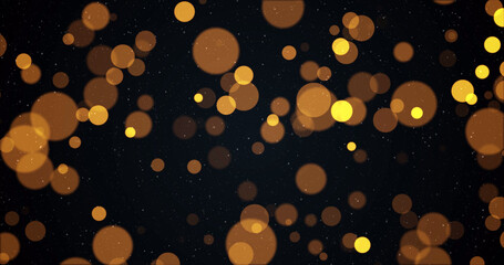 Image of warm glowing yellow and orange spots on black background