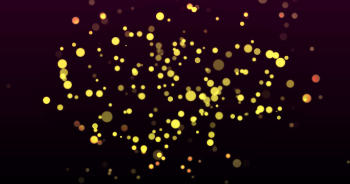 Image of warm glowing yellow spots on black background