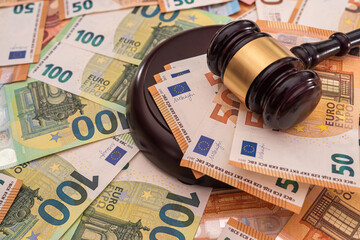 euro banknotes with judge hammer