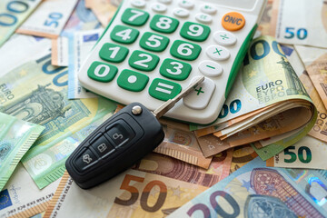Car key with calculator on a european money