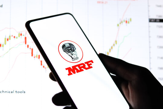 West Bangal, India - October 09, 2021 : MRF logo on phone screen stock image.