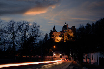 Sunset at Bran Castle, Transylvania, Romania. Medieval building, Dracula's Castle. Mystical landscape.