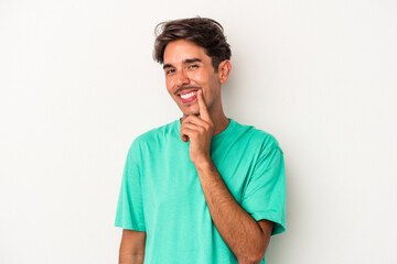 Fototapeta na wymiar Young mixed race man isolated on white background smiling happy and confident, touching chin with hand.