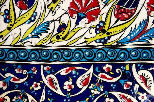 Traditional ottoman patterns on the porcelain surface. Traditional Turkish tile art called cini. &Ccedil;ini patterns. &Ccedil;ini art. Ottoman floral motifs. Geometric ornamental patterns background.