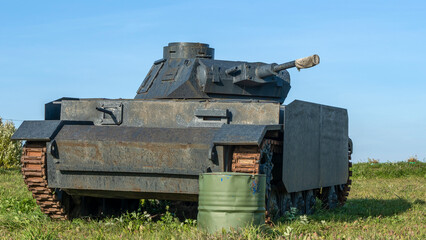 Vintage German World War 2 armored heavy combat tank poised on the battlefield. Historical concept.