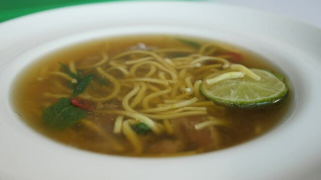 restaurant dish - traditional Thai pho bo soup
