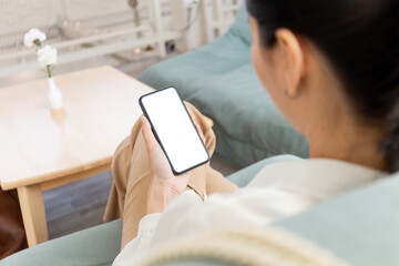 cell phone blank white screen mockup.hand holding texting using mobile on desk at office.background empty space for advertise.work people contact marketing business,technology