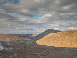 Spectacular helicopter tour over the lava fields and Fagradalsfjall volcano crater, Iceland.