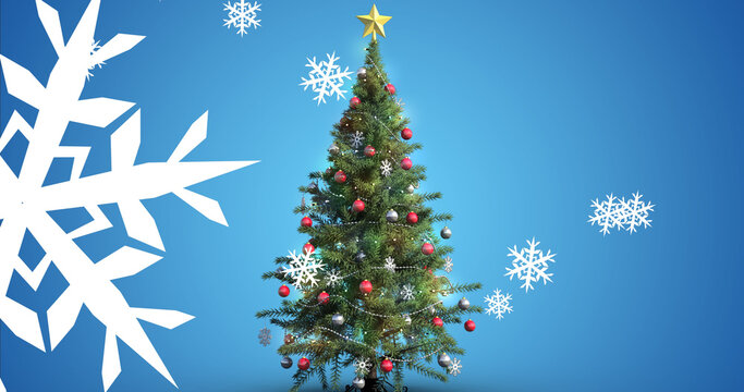 Image of christmas tree and snow falling on blue background