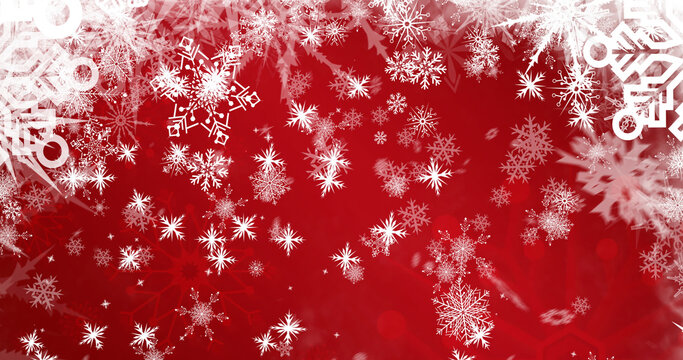 Image of snow falling over snowflakes at christmas, on red background