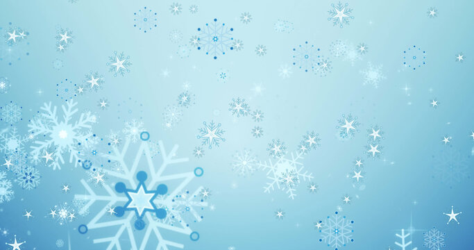 Image of falling over snowflakes on blue background