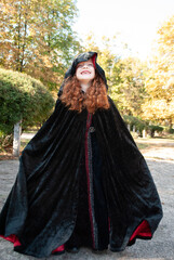 a girl in a witch costume for Halloween