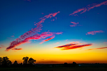 Fototapeta premium sunset panorama. sunset over a forest in Poland